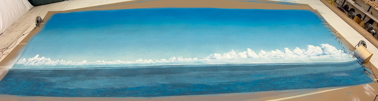 Sea with Cumulus Clouds Backdrop