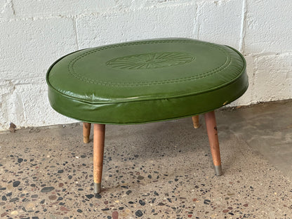 Carved Green Leather Oval Ottoman